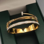 Kruta luksuzna ekser narukvica zlatna